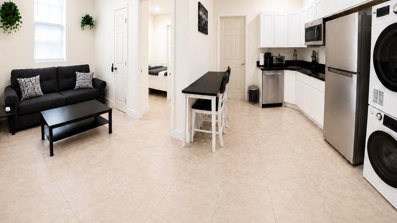 Living room and kitchen in one of our 1-bedroom apartments, Dorchester, Boston