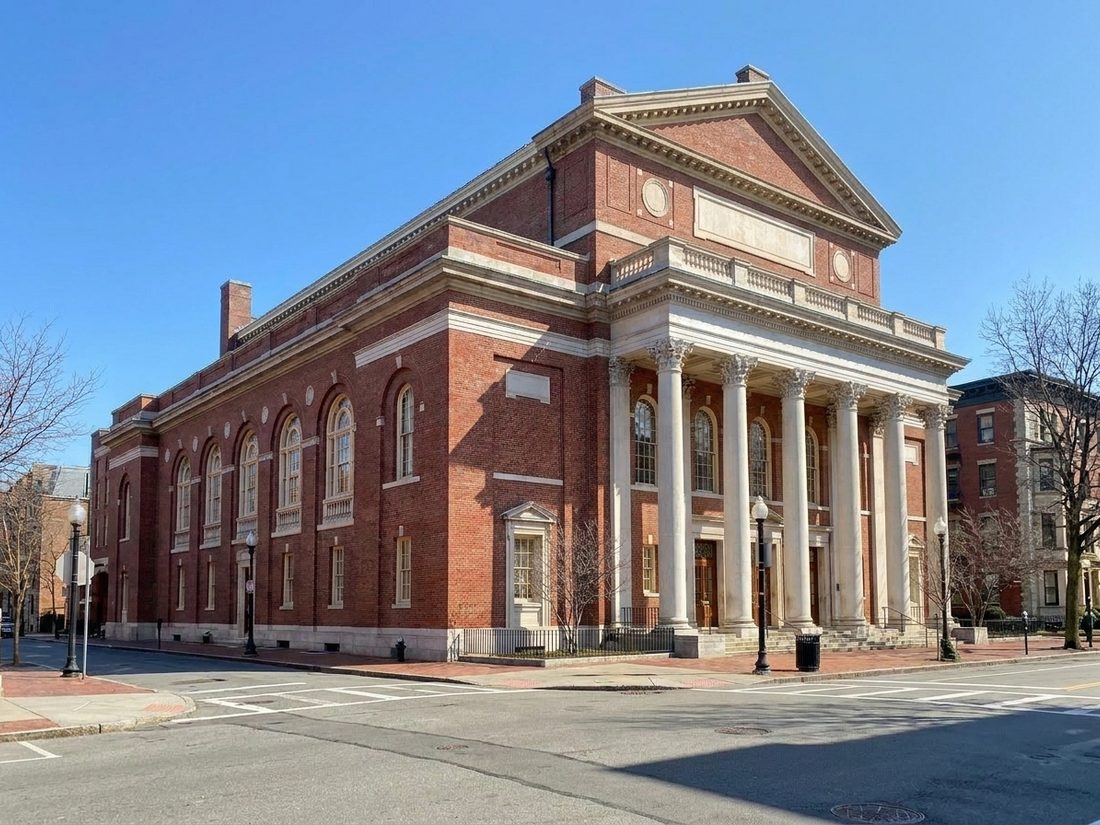 Drawing of Boston's red-brick Symphony Hall with its white columned portico on a sunny day